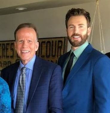 G. Robert Evans III with his son Chris Evans.